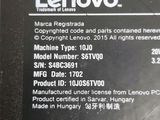 the back of a lenovo laptop with a price label on it