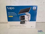 a white box with a solar powered camera on it