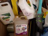 a box full of cleaning products and other household items