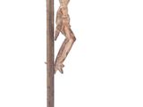 a figurine of a man on a pole with a baseball bat