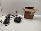 a box with a remote and a box with a charger on it