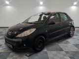 a picture of a black car parked in a garage