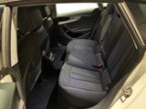 the back seats of a car with a seat belt in a car