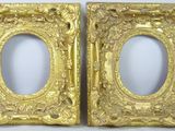 pair of antique gold picture frames with ornate design