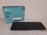 a wireless keyboard and a wireless mouse on a table