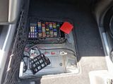 the interior of a car with a bunch of electronics in it