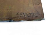 an old book with writing on it sitting on a table