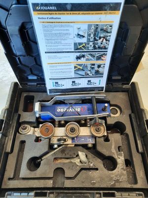 a box with tools in it on a table