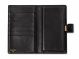 a black leather wallet with a gold logo on the front