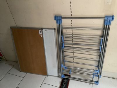 a picture of a bathroom with a towel rack and a door