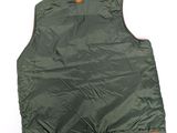 the back of a green vest with orange trims on a white background