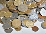 a pile of coins sitting on top of a table