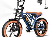 un vélo bleu et orange avec des jantes orange sur fond blanc