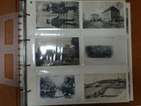 a binder with a bunch of old photos on it