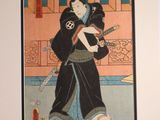a picture of a woman holding a cat in her arms