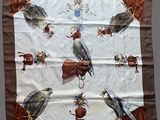 an image of a brown and white scarf with birds on it