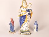three figurines of the virgin mary and child jesus