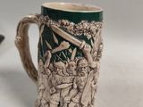 a green and white mug with a picture of a man and a woman on it