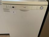 a white dishwasher sitting next to a washer