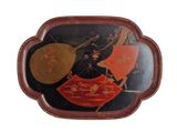 a tray with a decorative design on it on a white background