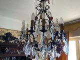 a chandelier that is hanging from the ceiling in a room