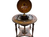 an image of a table with a compass on top of it
