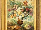 une peinture à l'huile représentant des fleurs dans un vase sur une table