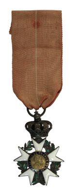 l'image d'une médaille surmontée d'une étoile