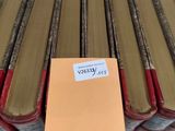 several books stacked on top of each other on a table
