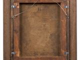 an old wooden picture frame with a rope hanging from it ' s sides
