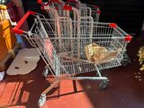 a shopping cart that is sitting on the floor