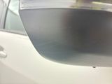 a close up of a car ' s rear view mirror