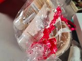 a box of cookies and a bag of chocolates on a table