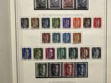 a picture of a picture of a collection of stamps on display