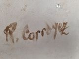 a brown writing that says i carry on the wall