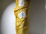 a large bag of food wrapped in plastic on a table