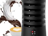 a close up of a blender with a cup of coffee next to it