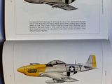 two pages of a book with a picture of a plane and a plane with a cross on it