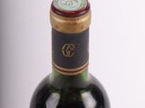 a bottle of wine that is sitting on a table