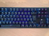 a computer keyboard that is sitting on a table