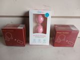 packaging of a pink magic mouse and a box of pink magic mouse