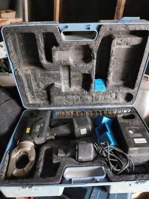 a tool in a case that is sitting on a table