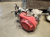 a small engine that is sitting on the floor