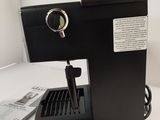 a coffee machine that is sitting on a table