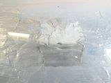 a piece of cake that is sitting on a piece of foil