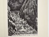 an open book with a drawing of a mountain and a river in it