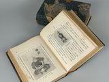 an open book with a picture of a man and a woman on it