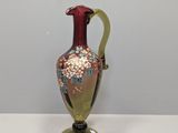 a vase that is sitting on a white table