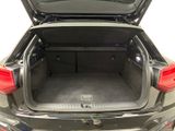 the back of a car with the trunk open and the trunk of the vehicle in the back