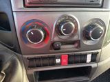 a close up of a car ' s radio and controls